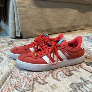 Adidas Red Sneakers with White Stripes